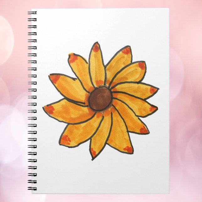 Cuaderno Mano de tinta amarilla de girasol dibujada (A notebook with a hand drawn sunflower with red and orange tips.)