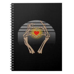 Cuaderno Manos de esqueleto haciendo un clásico del corazón