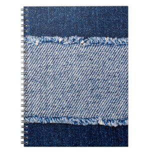 Cuaderno Marco de jeans azules de denim con bordes.