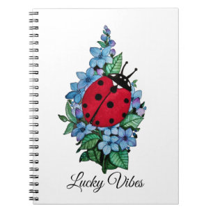 Cuaderno Mariquita linda de la acuarela con las flores