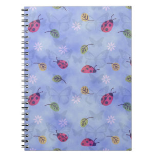 Cuaderno Mariquitas y hojas que caen patrón azul