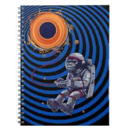 Cuaderno mono en el vuelo espacial