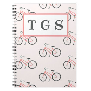 Cuaderno monograma de bicicletas rosa pálido con e