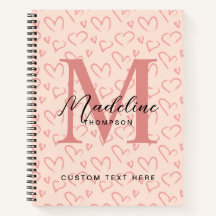 Monograma de letra script con patrón de corazón ro