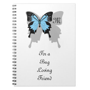 Cuaderno Monograma de sombra de mariposa con respaldo azul