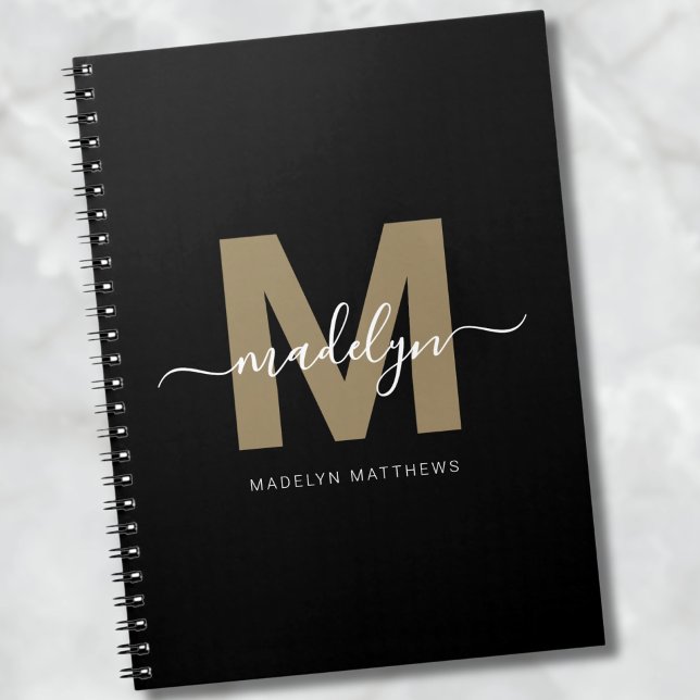 Cuaderno Monograma inicial con nombre de letra script de or (Modern Black Gold Script Name Initial Monogram notebook)