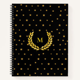 Cuaderno Monograma, laurel y estrellas doradas sobre negro