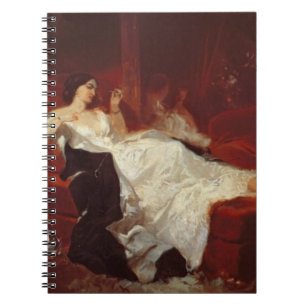 Cuaderno Mujer en un sofá rojo