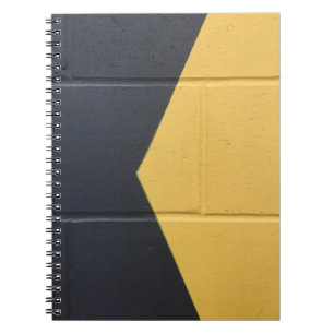 Cuaderno Muro de pintura negro y amarillo