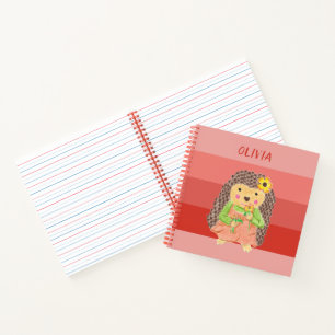 Cuaderno naranja erizo niño oliendo flores