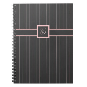 Cuaderno negro con rayas rosadas