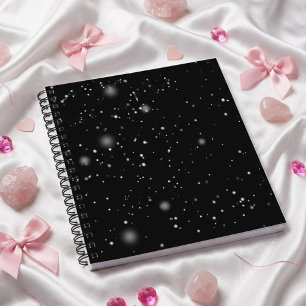 Cuaderno negro de nieve fresco cielo nocturno