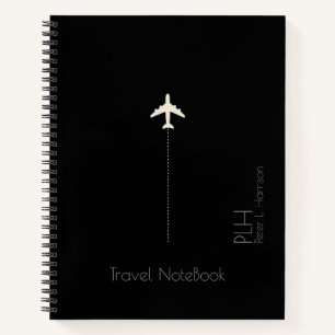 Cuaderno negro viaje avión