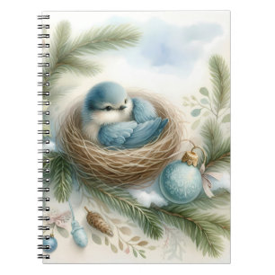 Cuaderno Nido de pájaro azul con adornos en pinos de invier