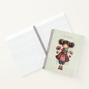 Cuaderno Niña con una muñeca de rana linda y caprichosa