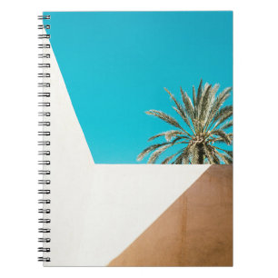 Cuaderno Palmera verde bajo cielo azul por la mañana