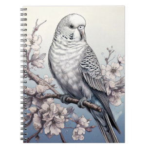 Cuaderno Parakeet en un bloc de notas azul suave