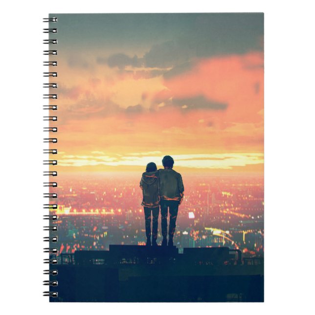 Cuaderno pareja joven de pie en la azotea mirando a c (Frente)