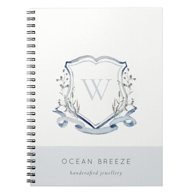 Cuaderno Pastel Azul Flor silvestre Escudo Monograma (Frente)