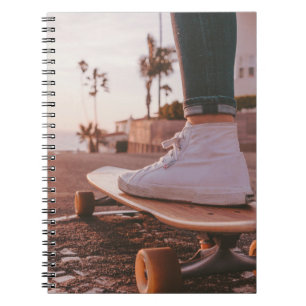 Cuaderno patinaje en la playa