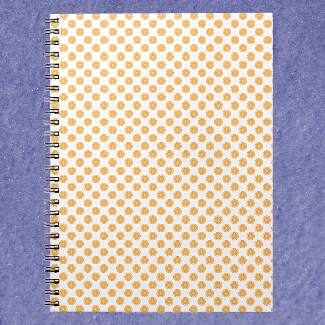 Cuaderno Patrón de cítricos naranja (A notebook with a pattern of orange slices.)