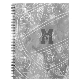 Cuaderno patrón de plumas de paisajes florales sobre voleib