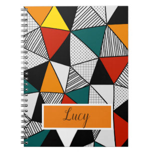 Cuaderno patrón geométrico de triángulos coloridos