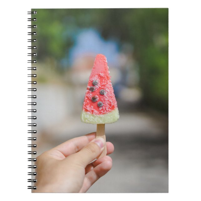 Cuaderno Persona sosteniendo paletas por la mañana (Frente)