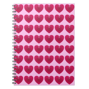 Cuaderno Pesos rojos rosas profundos en un fondo rosa pálid
