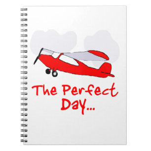Cuaderno piloto volando avión rojo