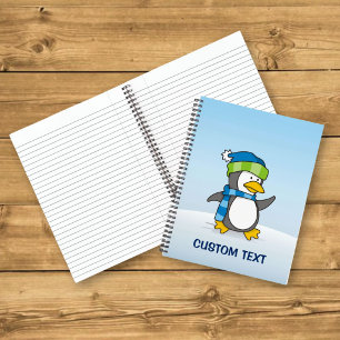 Cuaderno Pinguino pequeño caminando sobre la nieve