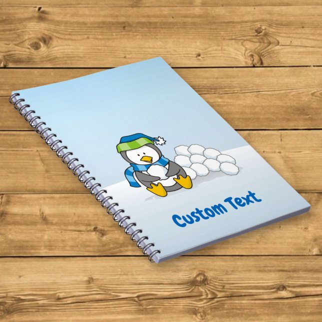 Cuaderno Pinguino pequeño sentado con bolas de nieve (Subido por el creador)