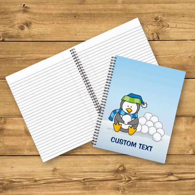Cuaderno Pinguino pequeño sentado con bolas de nieve (Subido por el creador)