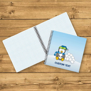 Cuaderno Pinguino pequeño sentado con bolas de nieve