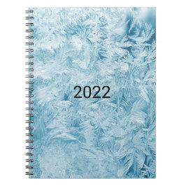 Cuaderno plumas azules abstractas y copos de nieve