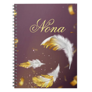 Cuaderno plumas doradas