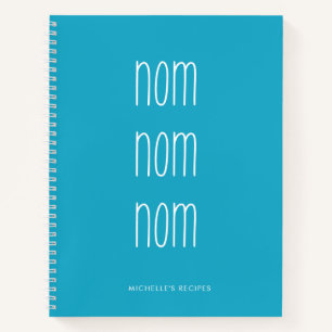 Cuaderno Receta de cocina de Nom Nom con escritura azul sua