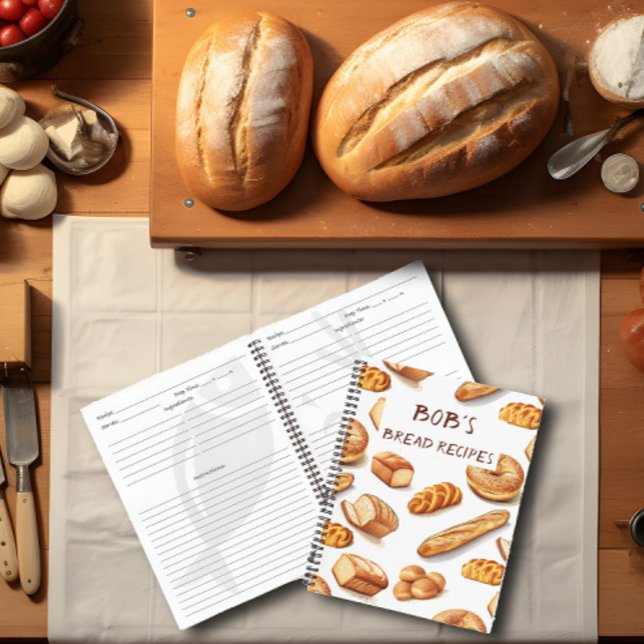 Cuaderno Receta personalizada de pan (A bread making recipe book lies on top of a kitchen counter surrounded by bread and supplies.)