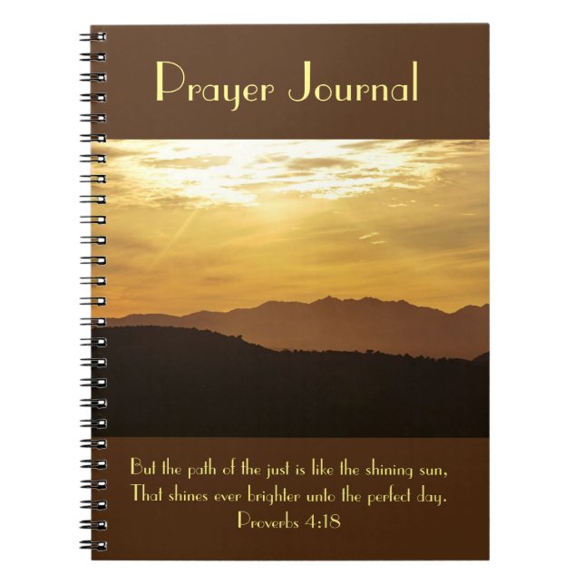 Cuaderno Revista de oración de sol brillante sobre montañas (Frente)
