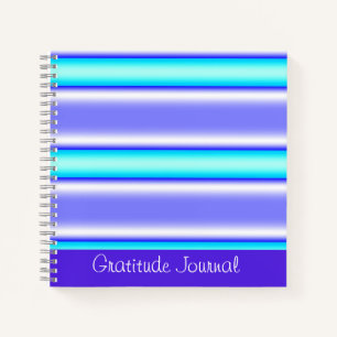 Cuaderno Revista Gratitude de rayas moradas azules y blanca