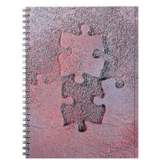 Cuaderno Rompecabezas rosa para el mes de la conciencia del