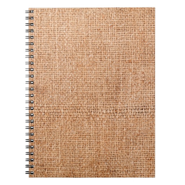 Cuaderno Ropa marrón sobre una sábana blanca. Retroceso abs (Frente)