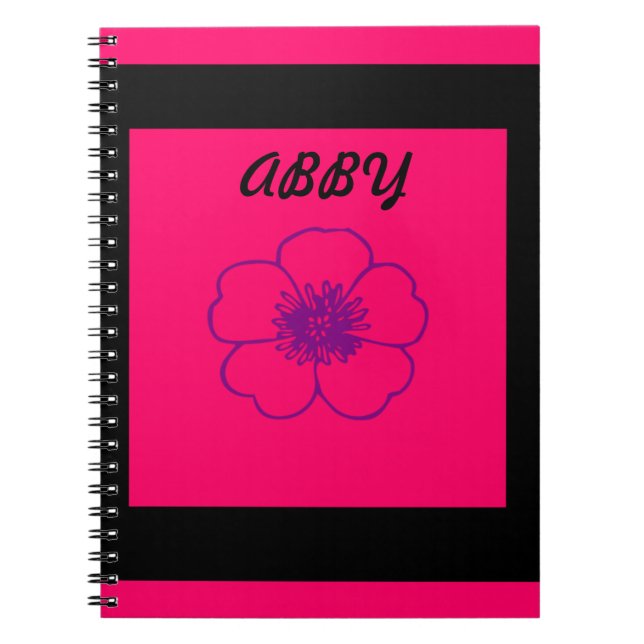 cuaderno rosado y negro de la foto (Frente)