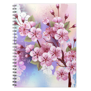 Cuaderno Sakura rosa sobre fondo de pintura
