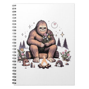 Cuaderno Sasquatch sosteniendo flores