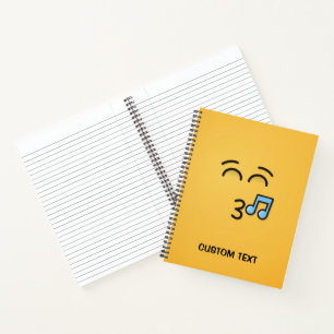 Cuaderno Silbando cara con ojos sonrientes