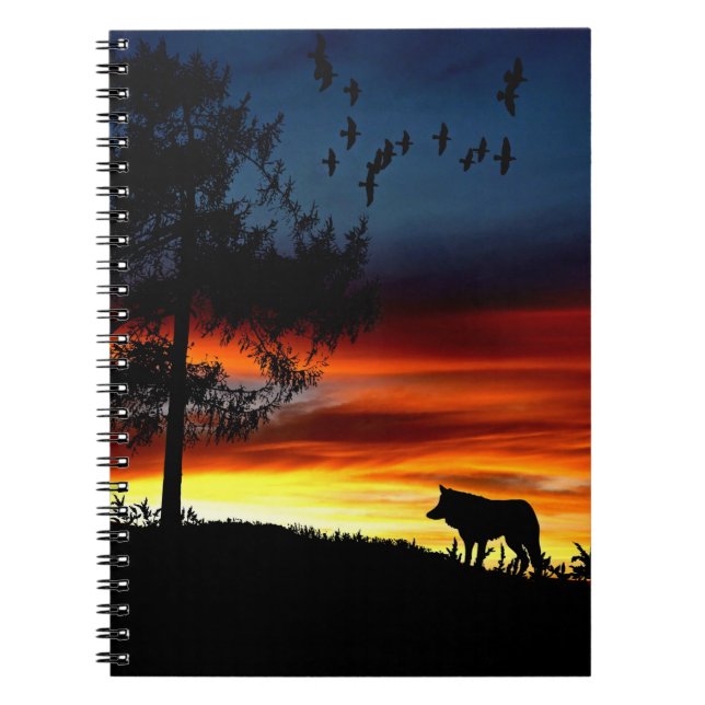 Cuaderno Silueta negra de lobo, pájaros y árboles al atarde (Frente)