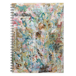 Cuaderno Spiral notebook with mixed media floral artwork.