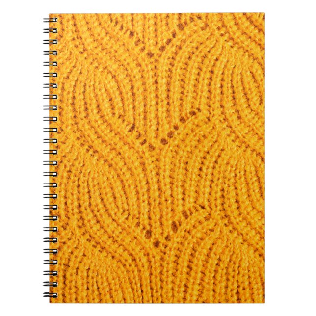 Cuaderno Suéter de punto naranja, fondo texturado. (Frente)
