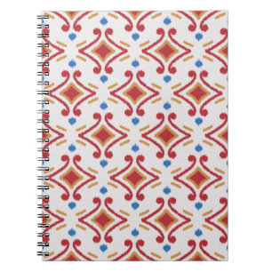 Cuaderno Tela Ikat hecha a mano. Patrón étnico sin fisuras.